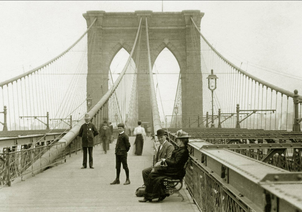 Could this be Lieutenant John Lussier waiting to meet his cat Commissioner on the Brooklyn Bridge? (The photo was taken way before his time, but one can imagine a similar scene.)
